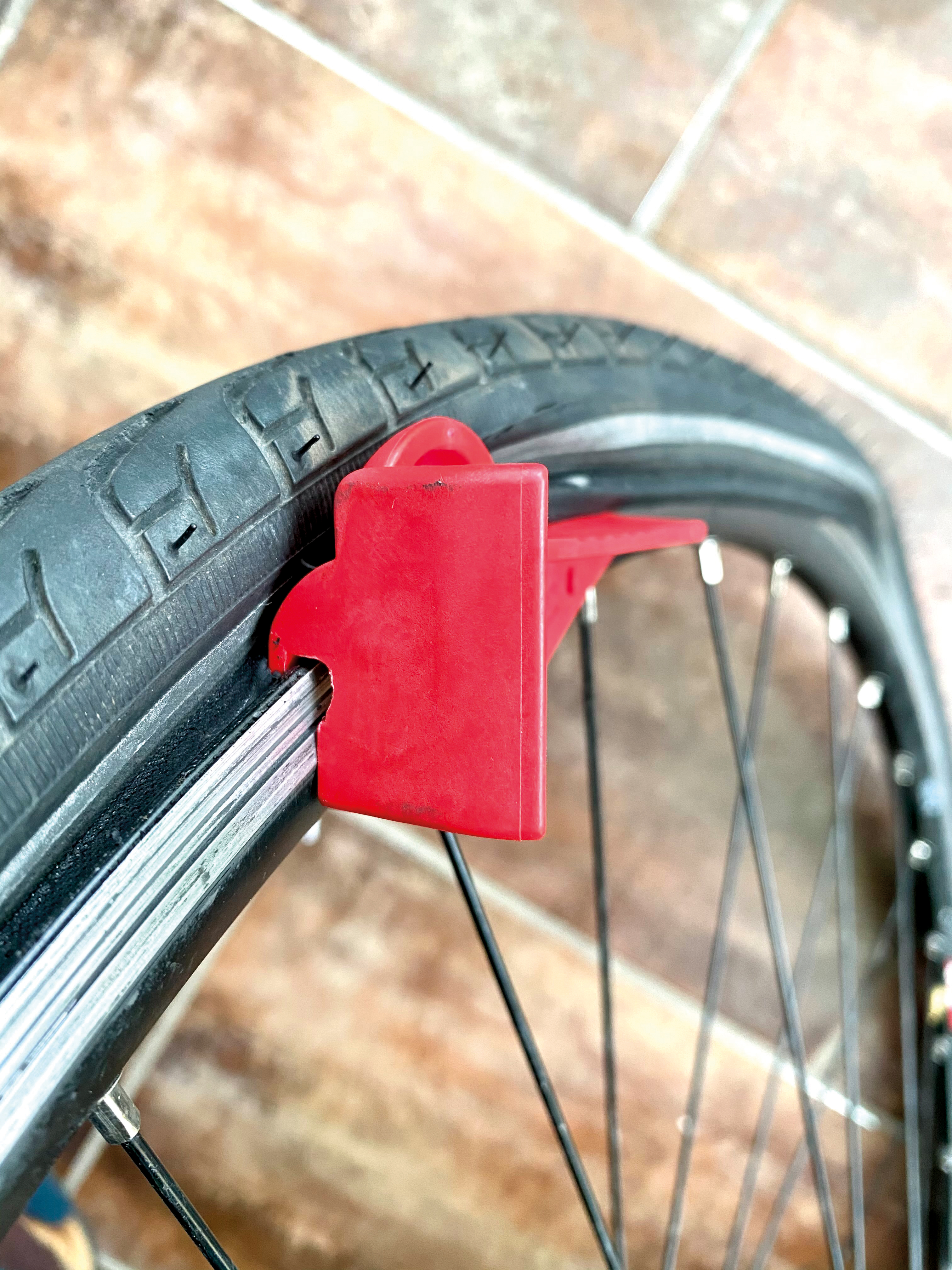 Bike tyre outlet removal tool